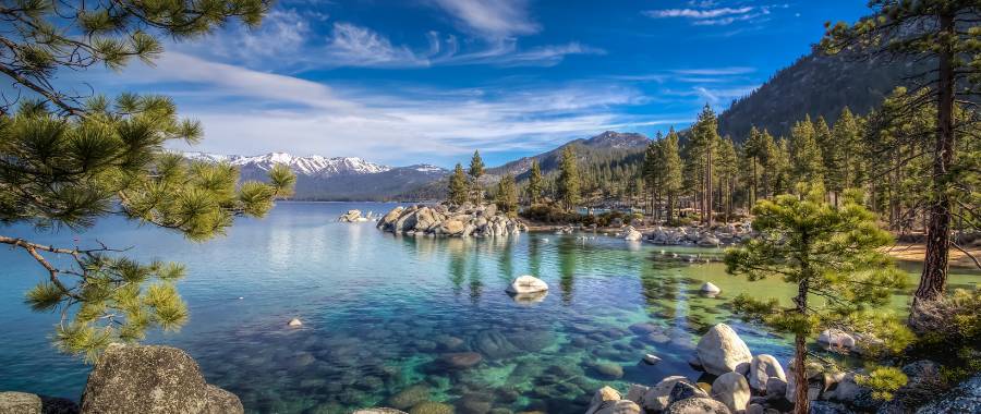 view of the rocky shore and crystal clear waters of Lake Tahoe