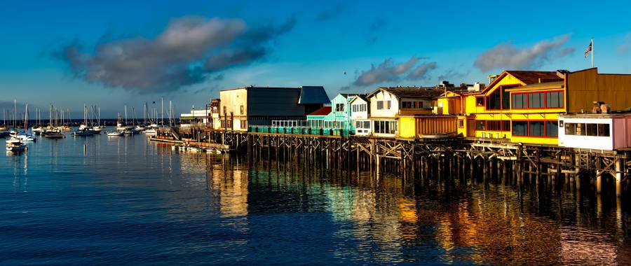 stilted houses over the water in Monterey california