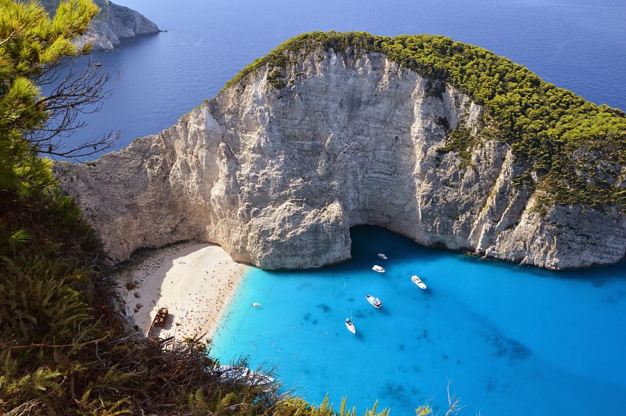 Wondering about the best beaches in Greece? Check out Navagio Beach Bay and Shipwreck Cove.
