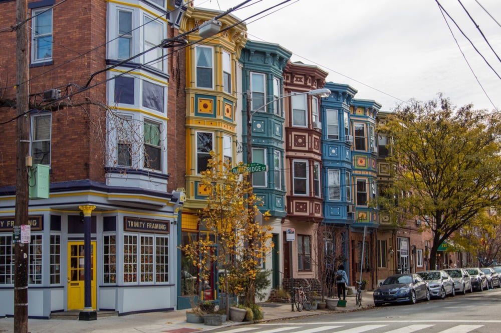 A row of colorful townhouses, a possibility for where to stay with a weekend in Philadelphia
