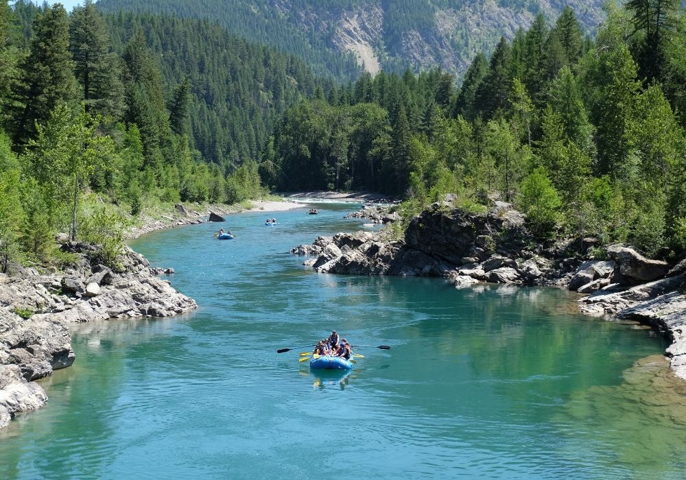Tourists enjoying whitewater rafting in Montana