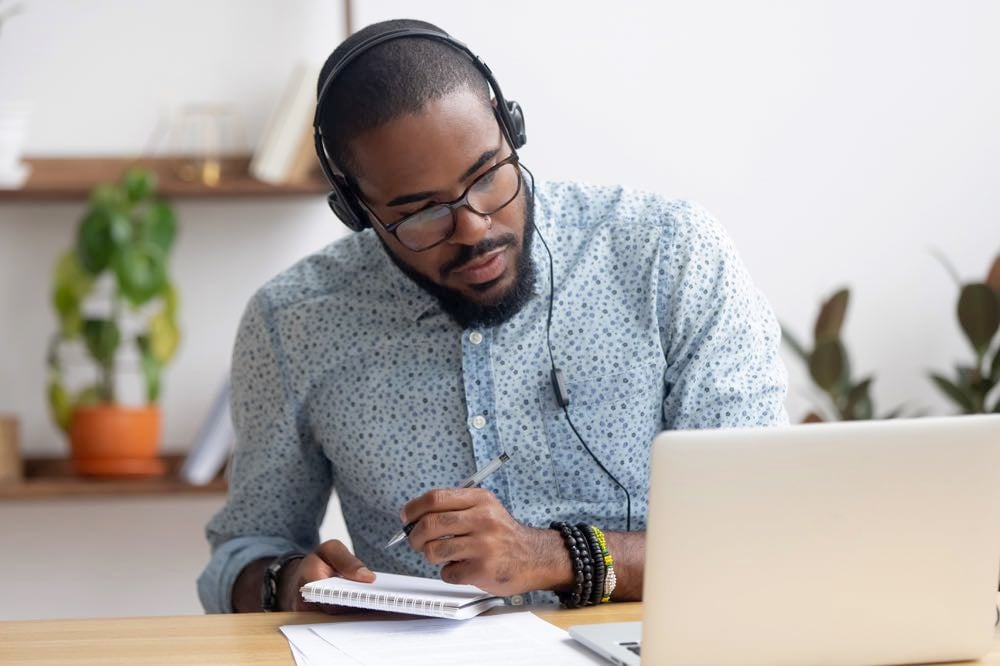 A headset with microphone is essential teaching English equipment.