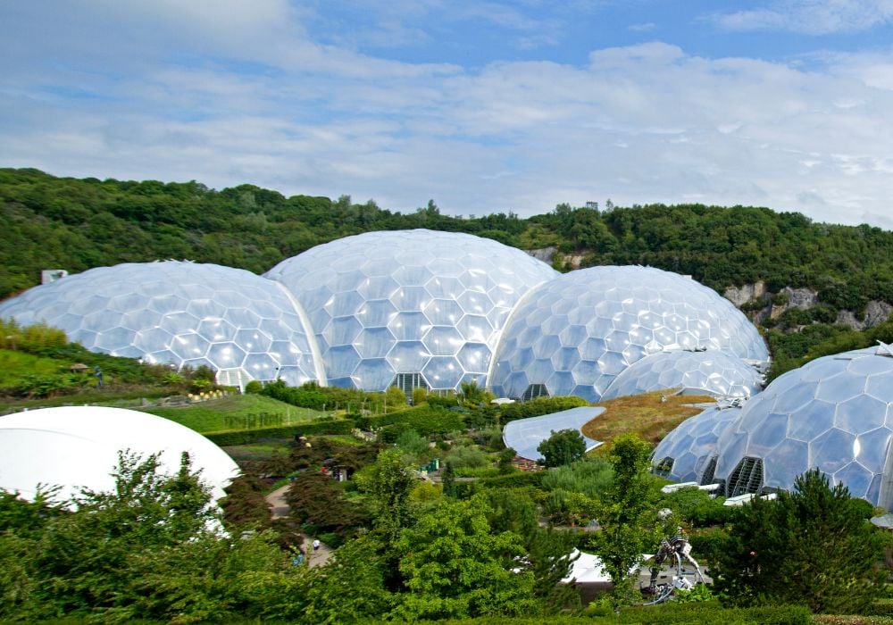 The Eden Project is a dramatic global garden housed in tropical biomes that nestle in a crater.