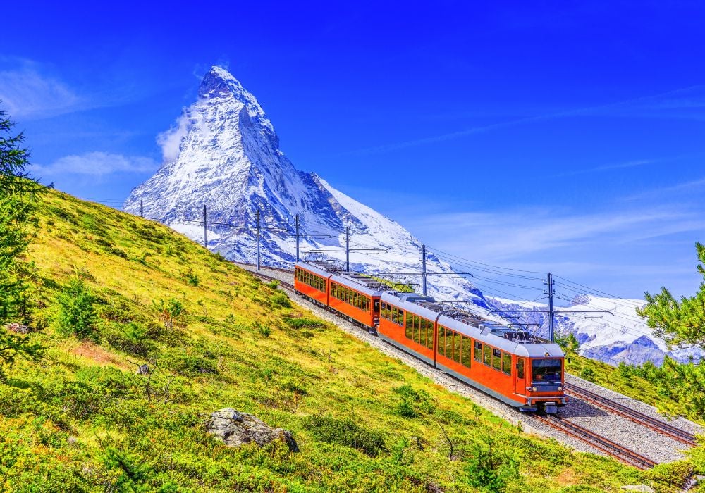 Tourist train with Matterhorn mountain in the background.