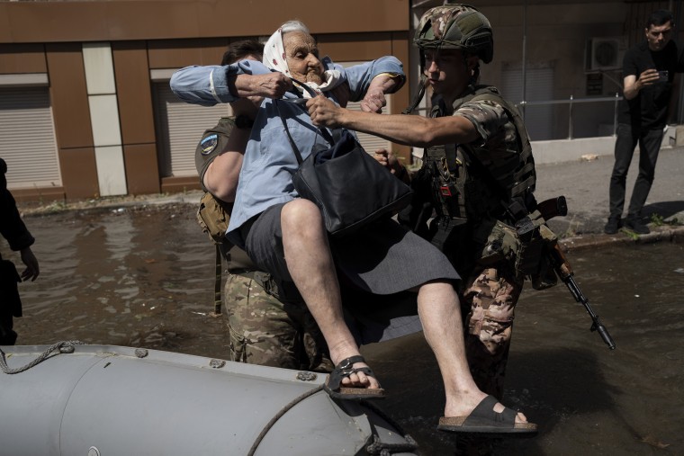 Residents of southern Ukraine braced for a second day of swelling floodwaters on Wednesday as authorities warned that a Dnieper River dam breach would continue to unleash pent-up waters from a giant reservoir.