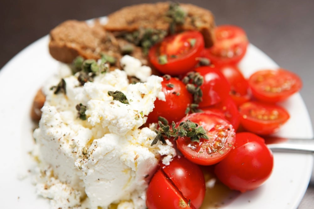 Traditional Crete food often includes cheese, tomatoes and bread.
