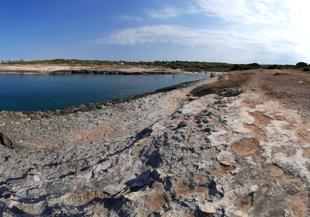 A panoramic view of the beautiful Spiaggia di Torre Pozzelle in Ostuni, Italy