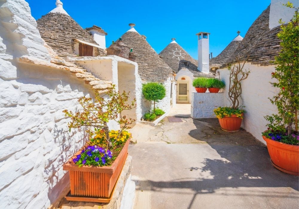 Trulli of Alberobello typical houses street view in Apulia, Italy