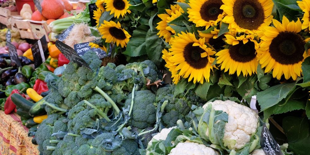 Flowers and vegetables at the Saturday market in Ostuni