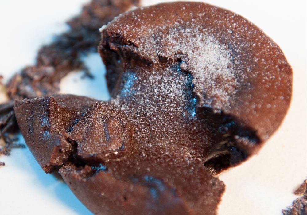 Chocolate souffle baked with dark chocolate shavings and fruit