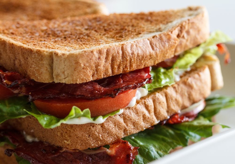 BLT club sandwich with bacon, lettuce and tomato