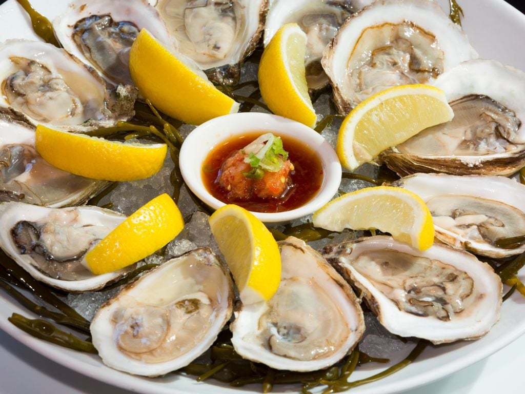 plate of oysters and lemons