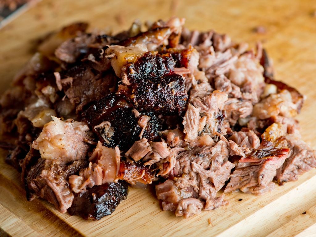 cutting board with smoked brisket