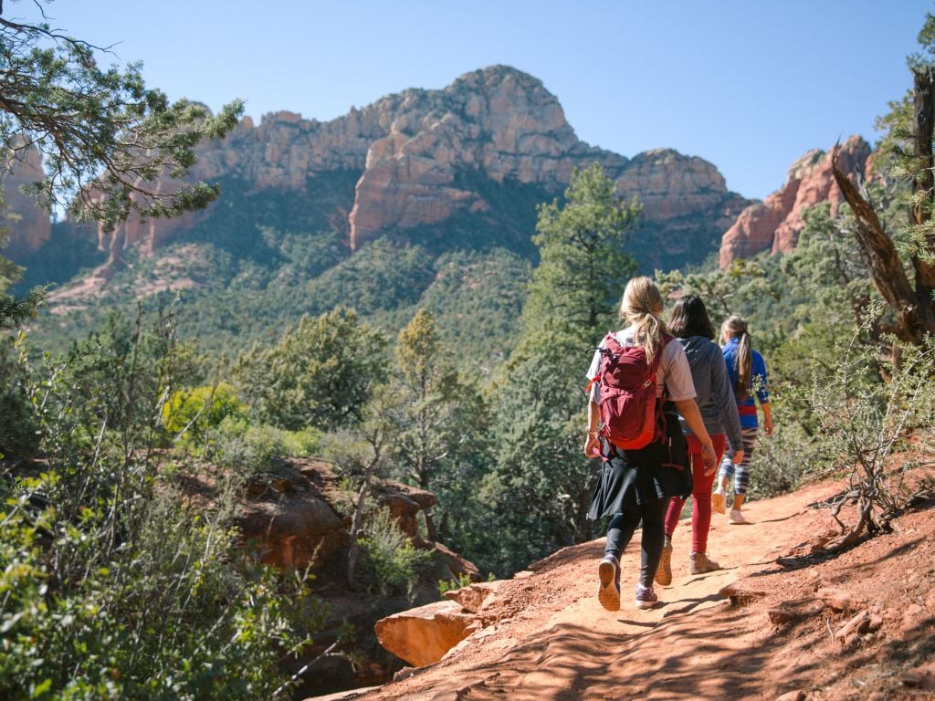 3 friends hiking in sedona arizona