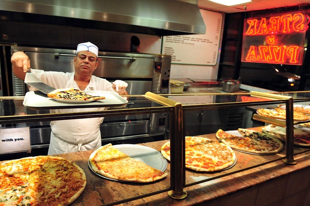 eating pizza in new york city on a weekend trip