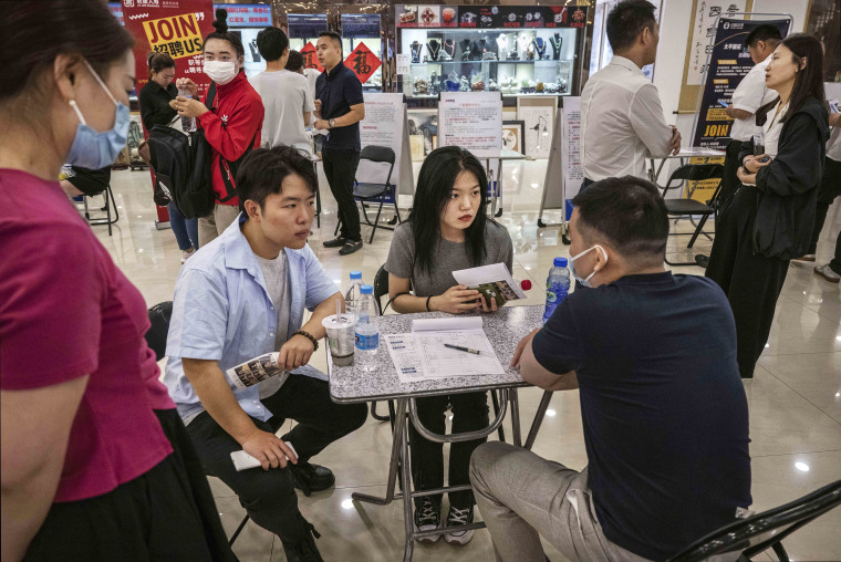 Workers In China Seek Employment At Job Fair