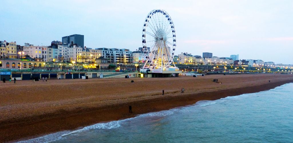 Brighton Beach with Ferris wheel and buildings