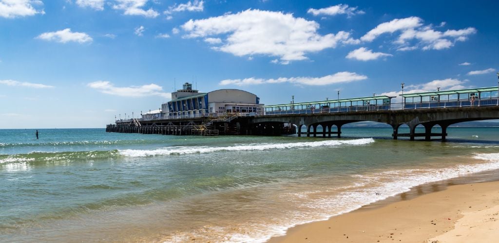 Bournemouth Beach with floating bridge and a big structure for tourists