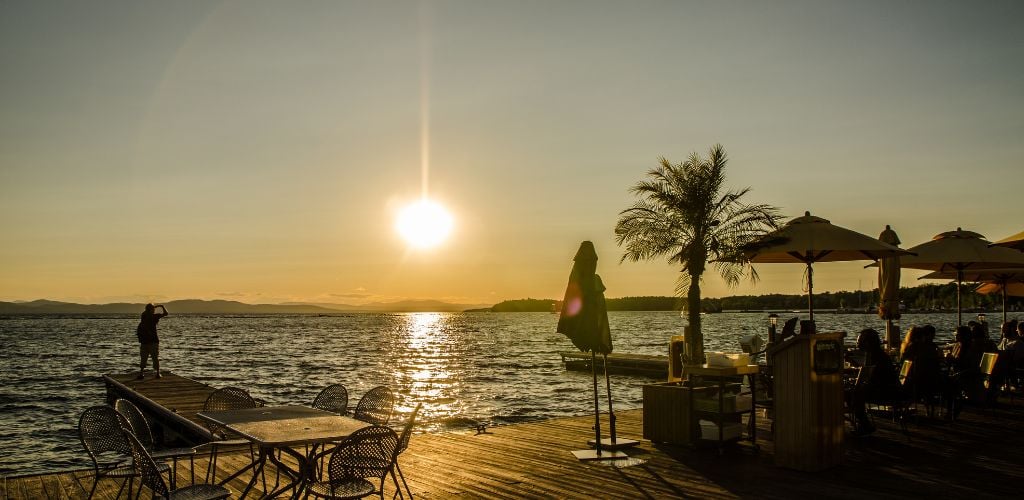 Restaurant with lake fiew and sunset.