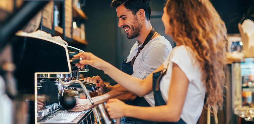 A baristas making coffee