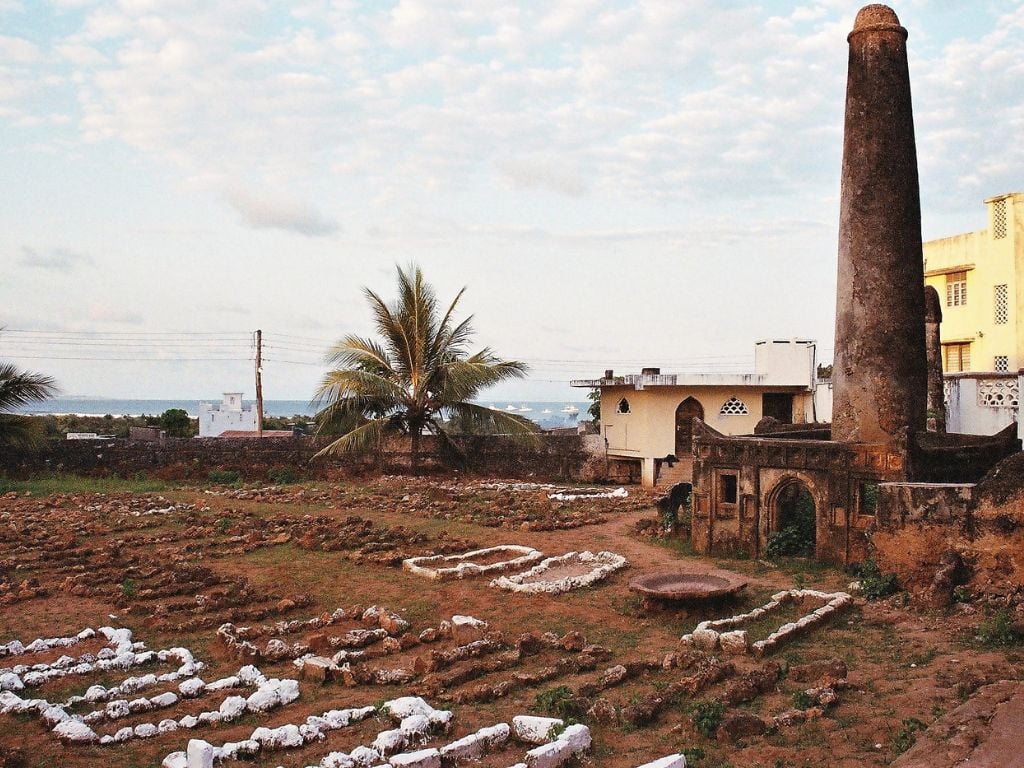 stone pillar with old houses in malindi kenya