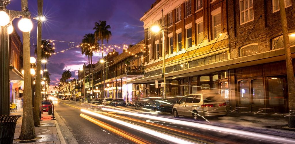 Slow shudder photo taken of Tampa Ybor City at Night with streaking lights (Tampa Nightlife)