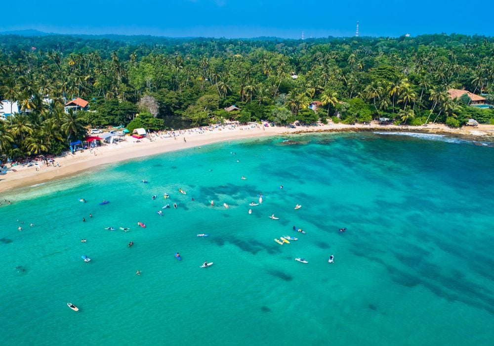 surfing Hiriketiya, Dikwella in Sri Lanka