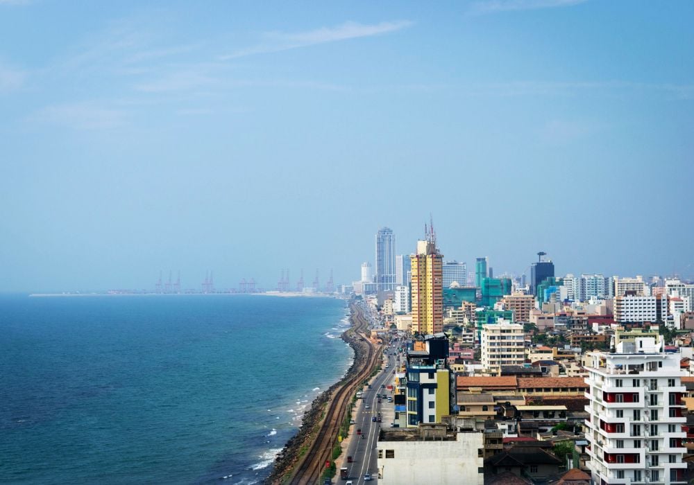 city of colombo in sri lanka with tall buildings by the sea
