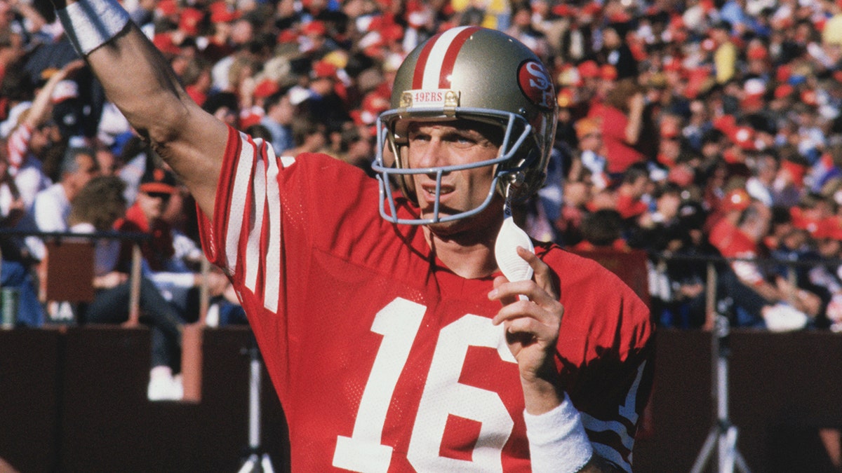 Joe Montana warms up