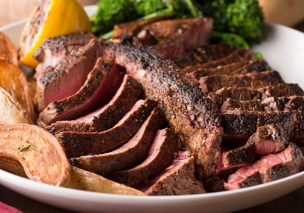 Porterhouse steak with fingerling potatoes and brocoli rabe.