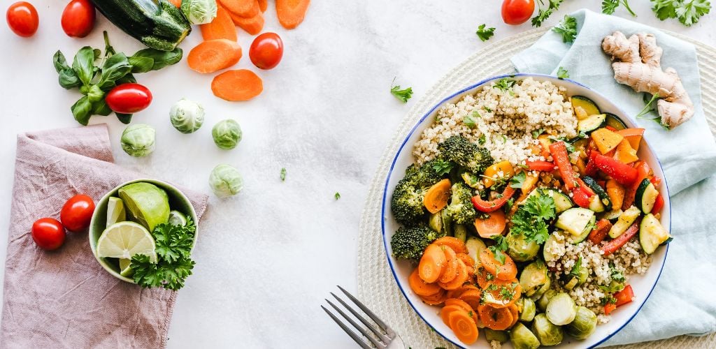 Delicious salad with ginger carrots lime cucumber and tomato