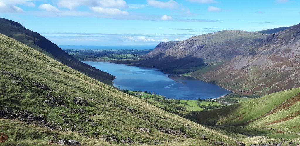 Scafell Pike (Lake District National Park) sky shading the water lake between the two mountains