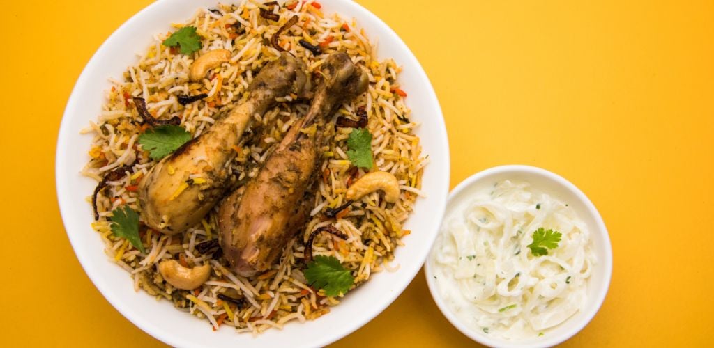 Biryani which consists of rice, chicken and spices with fermented radish.