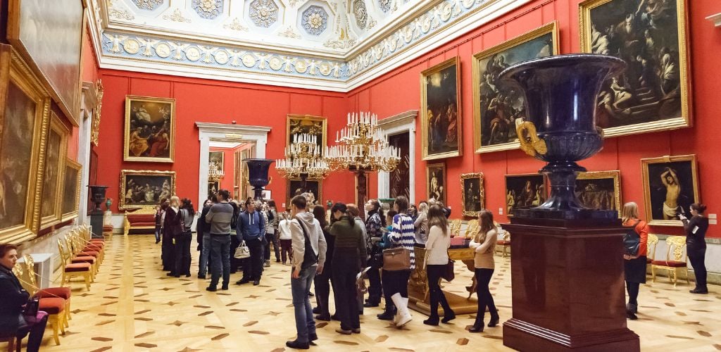 A group of people having a public art tour