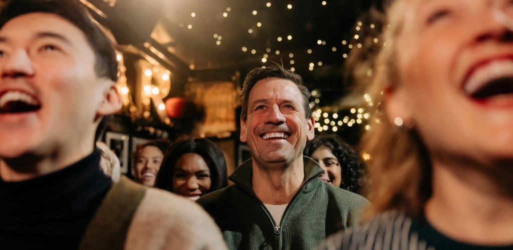 Folks Laughing at a Comedy Bar