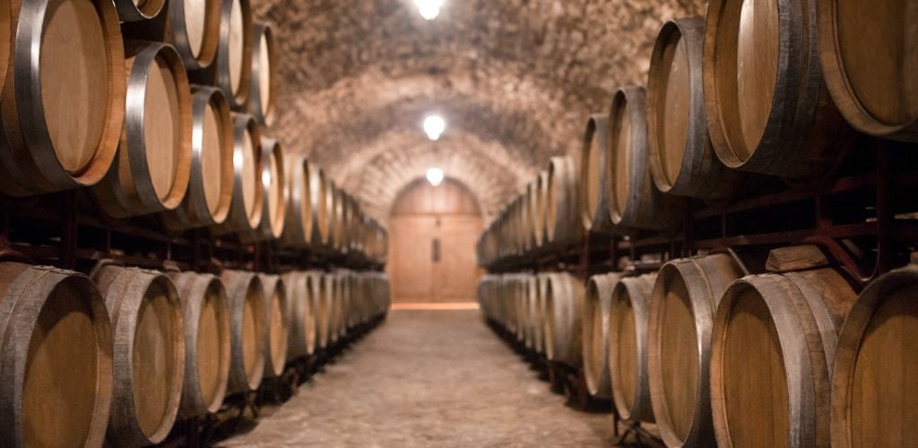 Racks of Wine barrel on a long corridor