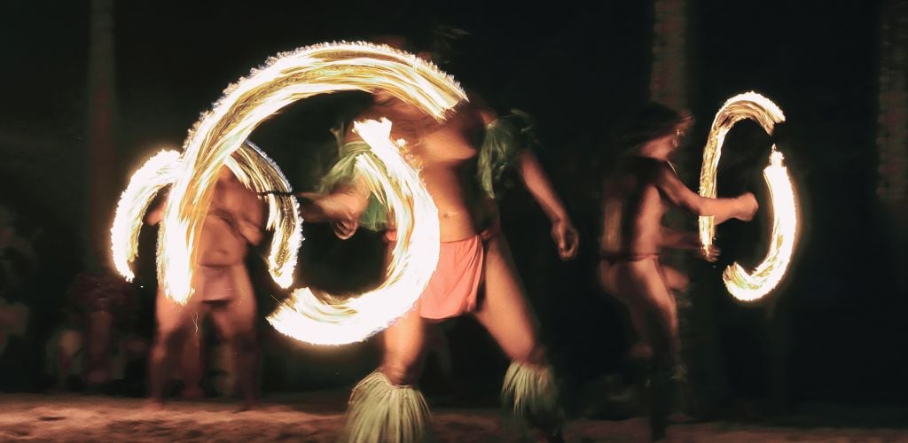 Polynesian Fire Being performed by 3 Men