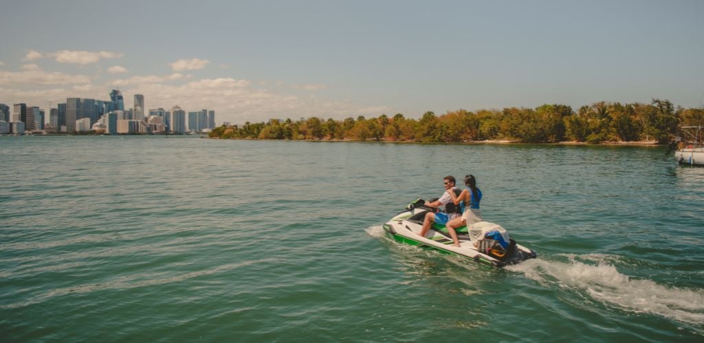 A couple cruising on a jetski in Orlando