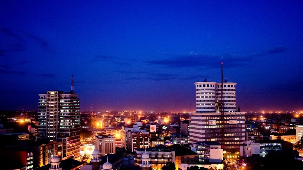 The beautiful downtown district of Nairobi, Kenya at dusk with city lights.
