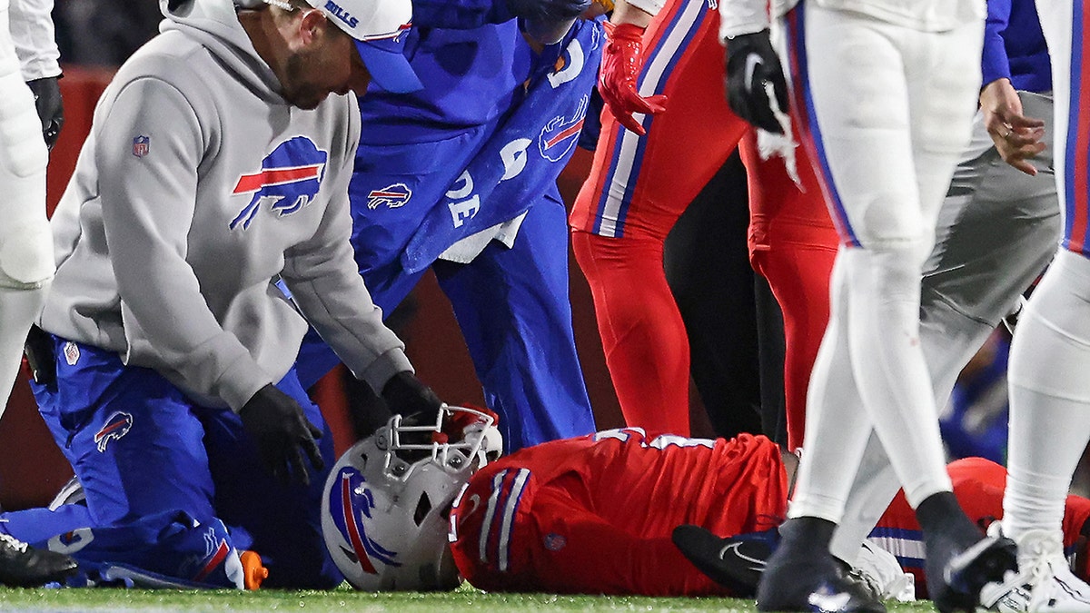 Damien Harris lays on field