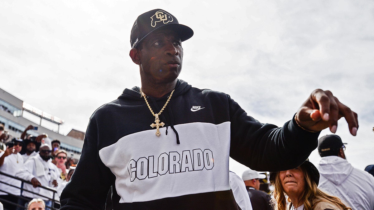 Deion Sanders walks off field