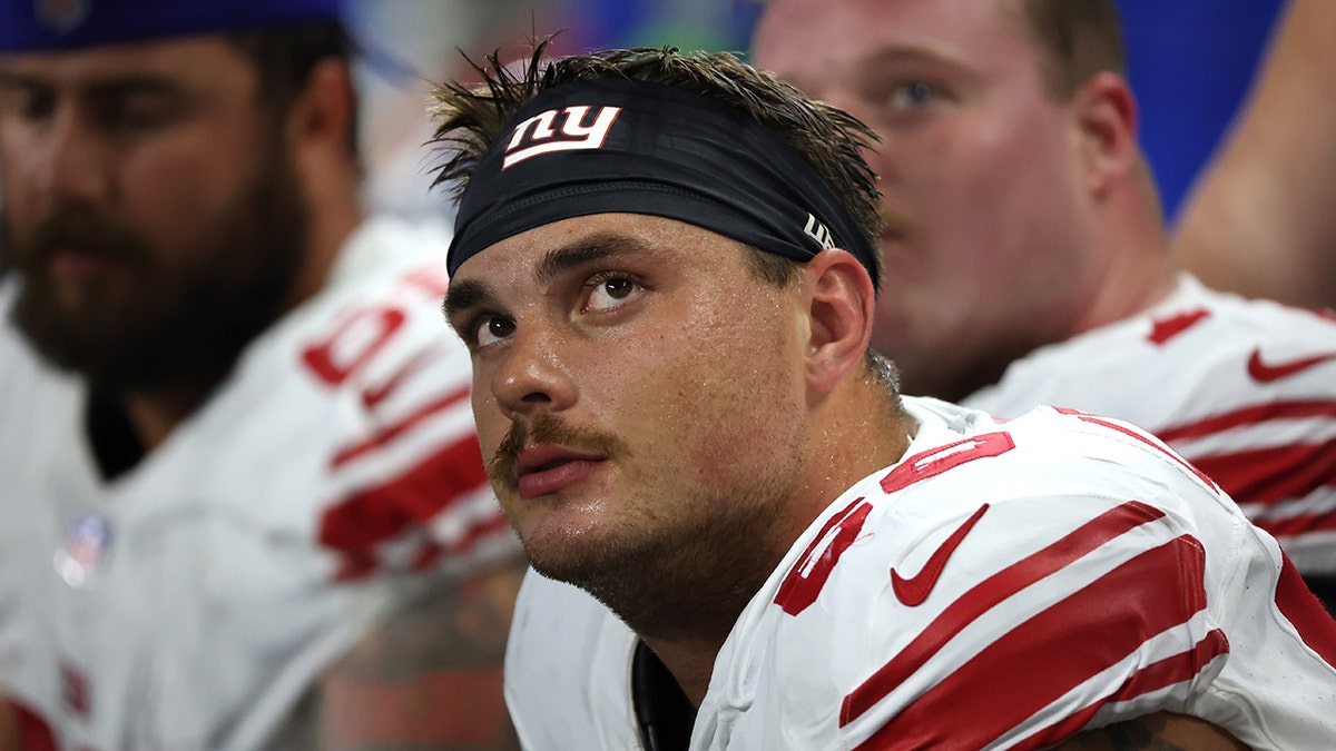 Shane Lemieux looks up from sideline