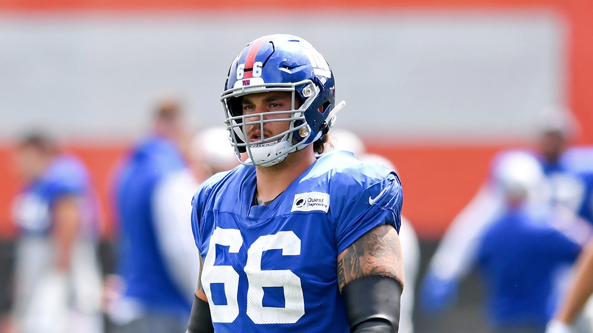 Shane Lemieux walks on practice field