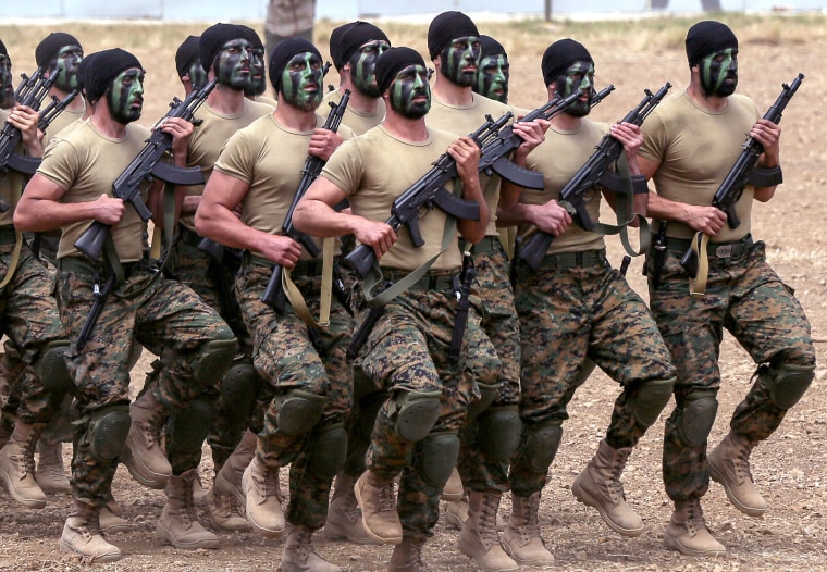 Hezbollah fighters military exercise in Lebanon.