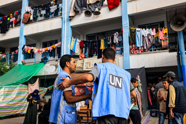 UNRWA workers at a shelter for displaced Palestinians in Khan Younis, Gaza.