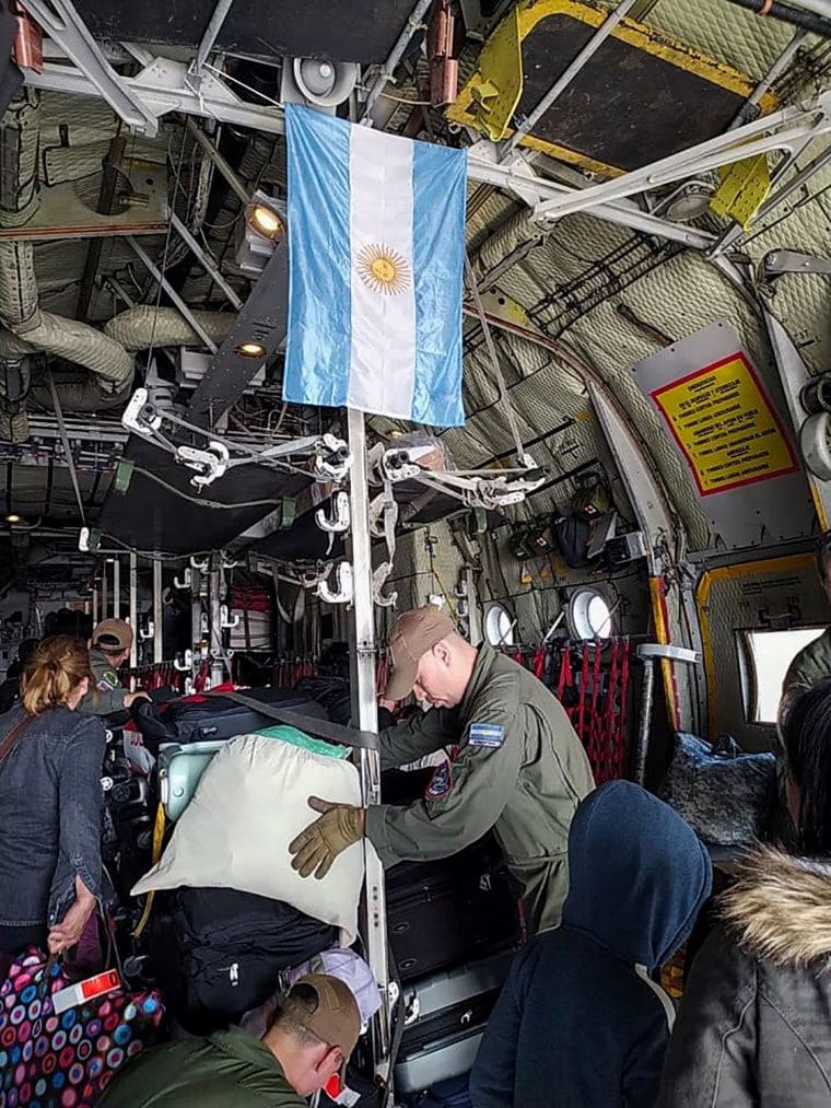 Argentine citizens boarding an Argentine Air Force C-130 Hercules aircraft at Ben Gurion International Airport in Tel Aviv, Israel, on Oct. 12, 2023.