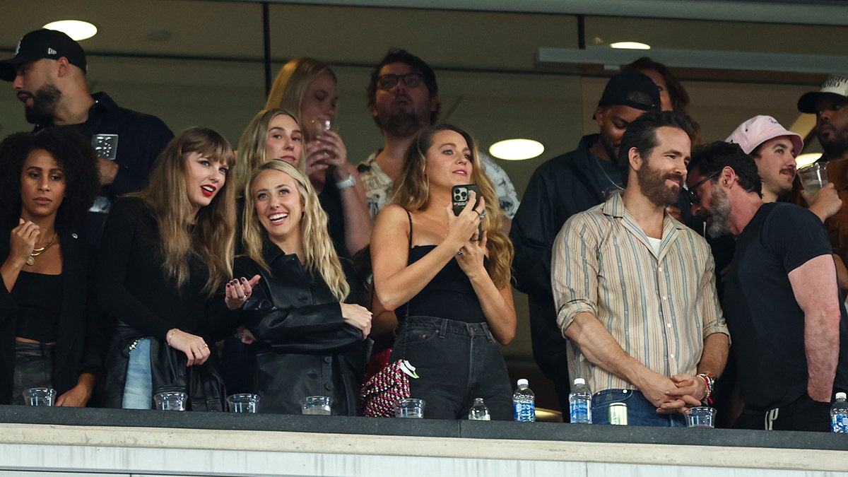 Taylor Swift and Brittany Mahomes laugh at MetLife stadium during Kansas City Chiefs game