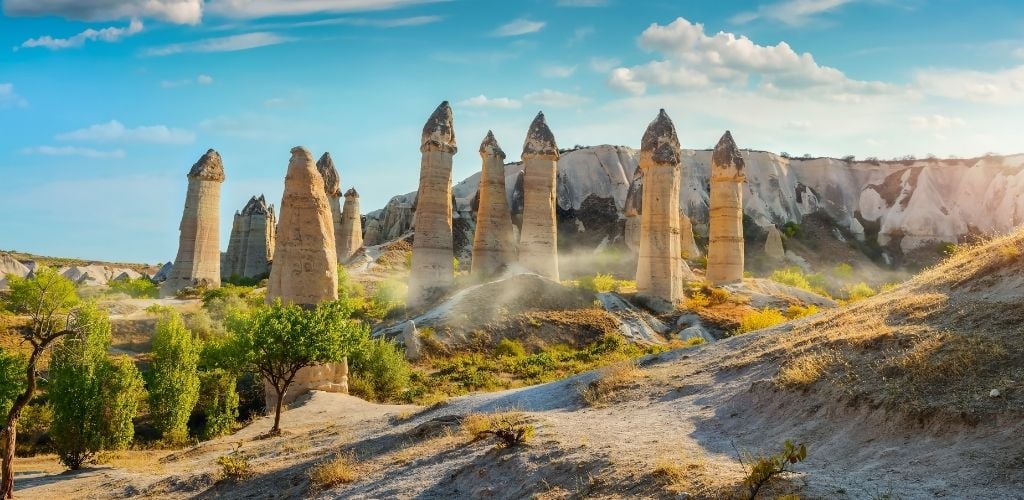 Love valley in Goreme national park surrounded by rock mountain. Cappadocia, Turkey