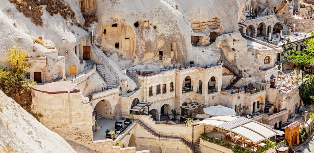 Cappadocia hotels carved from stone rock, cave style.