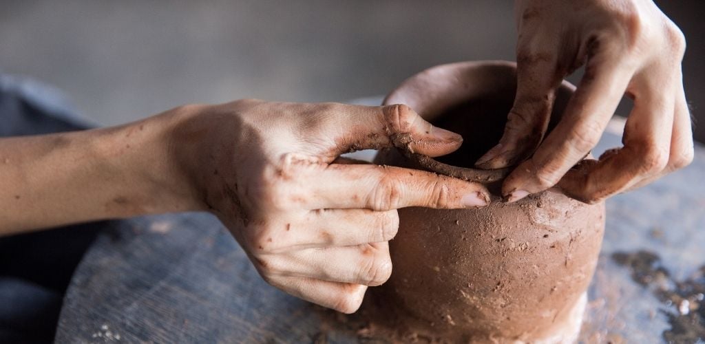 Potter makes pottery handmade